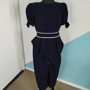 Classic Black Jumpsuit with White Trim
